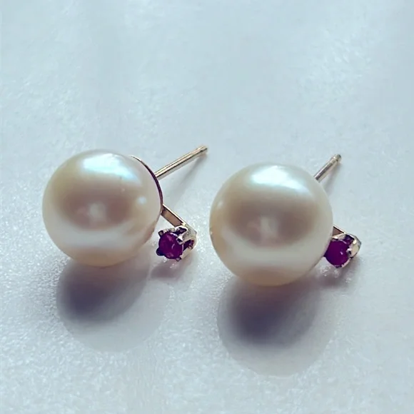 14k gold pearl and rubies stud earrings.